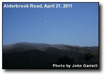 Moonset over Low Clouds